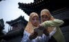two-muslim-chinese-girls-reading.jpg