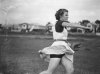 StateLibQld_2_105488_Female_baseball_player_in_action_on_the_field,_Brisbane,_1940.jpg
